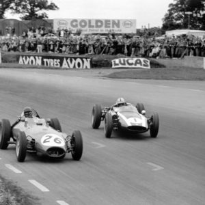 1960 British Grand Prix.Silverstone, Great Britain. 14-16 July 1960.David Piper (#26 Lotus 16-Climax) and Jack Brabham (#1 Cooper T53-Climax). They finished in 12th and 1st position respectively.World Copyright: LAT PhotographicRef: Autosport b&w print
