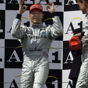 Formula One Austrian Grand Prix
A1 Ring, 16th July 2000. Race
Mika Hakkinen celebrates his victory in Austria - podium
World © Steve Etherington / LAT Photographic
Formatt: 18mb Digital