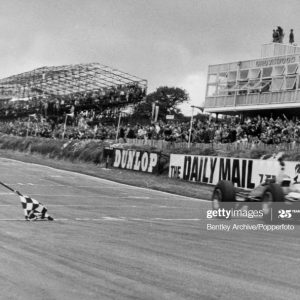 Sport, Motor Racing, Formula One, pic: 12th July 1964, European Grand Prix at Brands Hatch, Great Britain's Jim Clark crosses the line in a V8 Lotus to win the race  (Photo by Bentley Archive/Popperfoto via Getty Images/Getty Images)