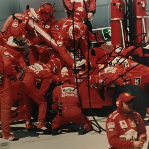 1999 Canadian GP pit stop photo signed by Michael Schumacher