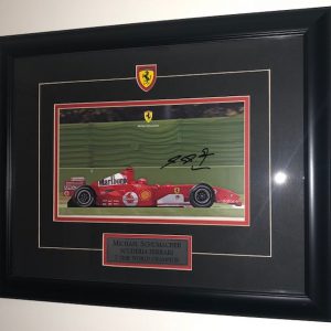2005 Michael Schumacher signed Ferrari F2005 action photo