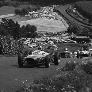 Nurburgring, Germany. 4 August 1963.
John Surtees (Ferrari 156), 1st position, leads Jim Clark (Lotus 25-Climax), 2nd position, action. 
World Copyright: LAT Photographic.
Ref:  L63 - 242 -12A.