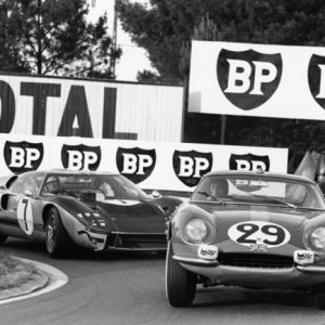 1966 Le Mans 24 Hours. 
Le Mans, France. 18th - 19th June 1966. 
Piers Courage/Roy Pike (Ferrari 275 GTB), 8th position, leads Graham Hill/Brian Muir (Ford GT40 MkII), retired, action. 
World Copyright: LAT Photographic. 
Ref: 1302 - 7-7A.