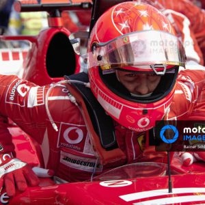 NüRBURGRING, GERMANY - MAY 07: Michael Schumacher getting out of his car in parc fermé during the European GP at Nürburgring on May 07, 2006 in Nürburgring, Germany. (Photo by Rainer Schlegelmilch)
