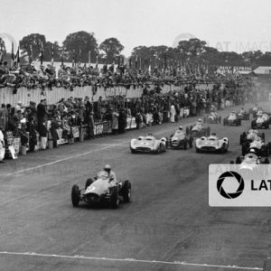 Silverstone, Great Britain. 17 July 1954.
Jose Froilan Gonzalez, Ferrari 625/555, 1st position, leads Stirling Moss, Maserati 250F, retired, Mike Hawthorn, Ferrari 625/555, 2nd position, Juan Manuel Fangio, Mercedes-Benz W196, 4th position, Jean Behra, Gordini 16, retired, and Karl Kling, Mercedes-Benz W196, 7th position at the start, action.
World Copyright: LAT Photographic