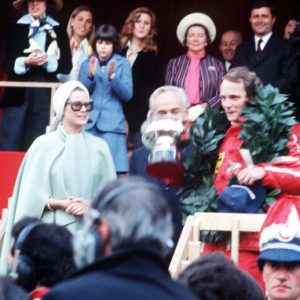 MONTE CARLO, MONACO - MAY 11: HSH Princess Grace and HSH Prince Rainier with Niki Lauda, 1st position, on the podium during the Monaco GP at Monte Carlo on May 11, 1975 in Monte Carlo, Monaco. (Photo by Ercole Colombo / Studio Colombo)