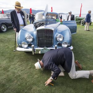 Judges view a 1954 Bentley Motors Ltd. R-Type Continental H.J. Mulliner Fastback during the 2019 Pebble Beach Concours d'Elegance in Pebble Beach, California, U.S., on Sunday, Aug. 18, 2019. More than 20,000 car enthusiasts gathered for the Pebble Beach Concours D'Elegance, where total auction sales are expected to bring in $378 million this year. Photographer: David Paul Morris/Bloomberg via Getty Images