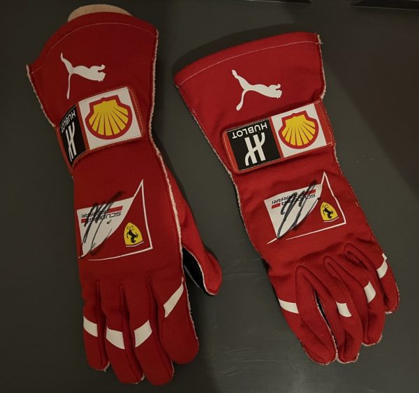 2017 Kimi Raikkonen signed and used Ferrari gloves