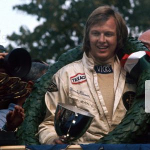 Monza, Italy. 9th September 1973.Ronnie Peterson (Lotus 72D-Ford), 1st position, on the podium with wife, Barbro, portrait. World Copyright: LAT Photographic.Ref:  73ITA