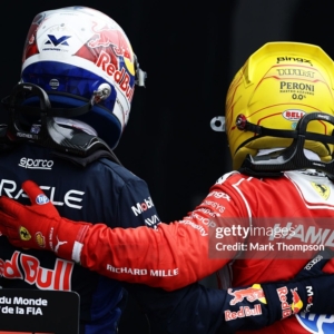 MONTREAL, QUEBEC - MAY 24: Second placed Lewis Hamilton of Great Britain and Scuderia Ferrari and Third placed Max Verstappen of the Netherlands and Oracle Red Bull Racing congratulate each other in parc ferme during the F1 Grand Prix of Canada at Circuit Gilles-Villeneuve on May 24, 2026 in Montreal, Quebec. (Photo by Mark Thompson/Getty Images)