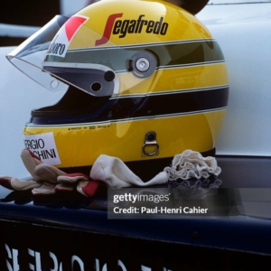 Ayrton Senna, Grand Prix of France, Dijon-Prenois, 20 May 1984. Ayrton Senna with his helmet on the sidepod of his Toleman-Hart. (Photo by Paul-Henri Cahier /Getty Images)