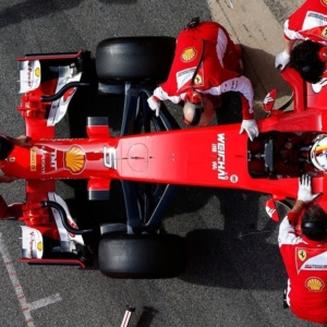 2015 F1 Pre Season Test 3 - Day 2 Circuit de Catalunya, Barcelona, Spain. Friday 27 February 2015. Sebastian Vettel, Ferrari SF15-T, gets pushed back into the garage. (Photo by Sam Bloxham/LAT Images)